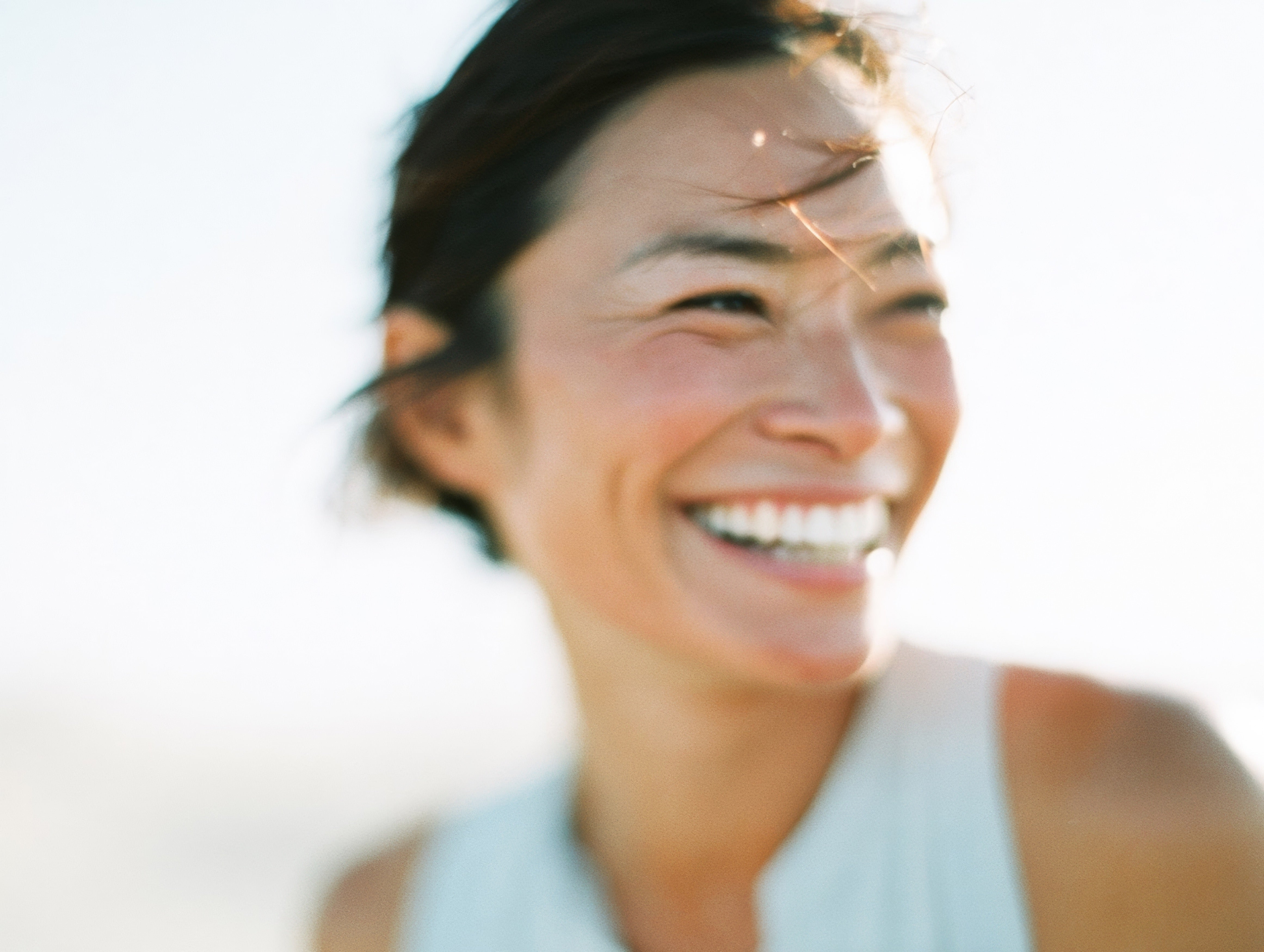 Woman smiling with radiant, healthy skin