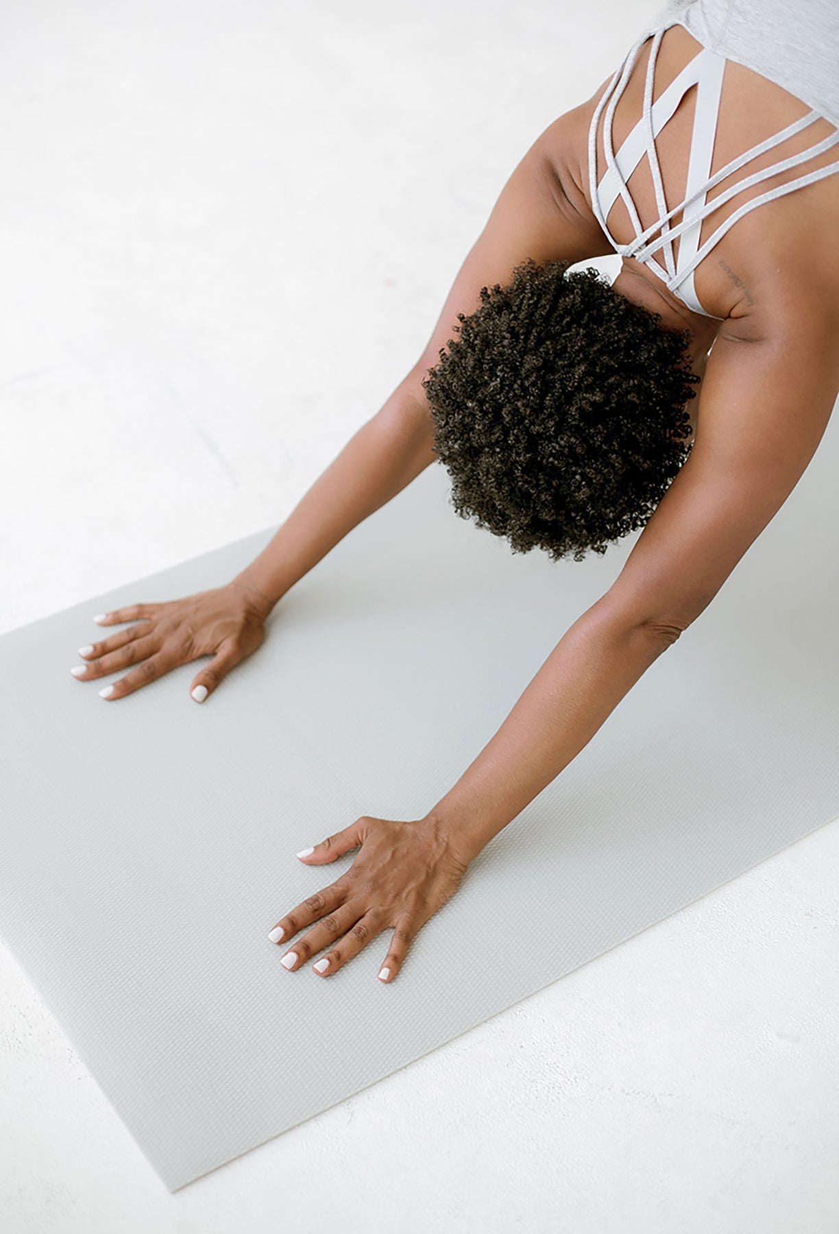 Woman practicing yoga for stress relief and mindfulness—supporting a balanced lifestyle and mental wellness naturally.