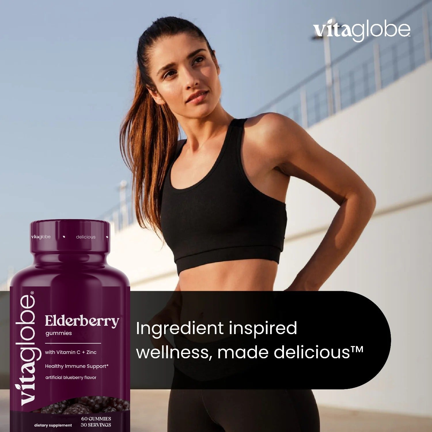 Woman in athletic wear with a bottle of Vita Globe Elderberry Gummies - Ingredient inspired wellness, made delicious