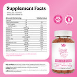 VG Gummies Supplement Facts label on a pink background, showing a white supplement facts panel with nutrition details and circular non-GMO and gluten-free badges. The product name Hair, Skin & Nails is visible at the bottom right, with VG Gummies branding and a bottle of gummies shown below.