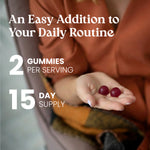 Person holding two red gummies with text about daily routine and serving size.