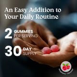 Hand holding gummies with text about serving size and supply duration, branded with a raspberry-flavored logo.