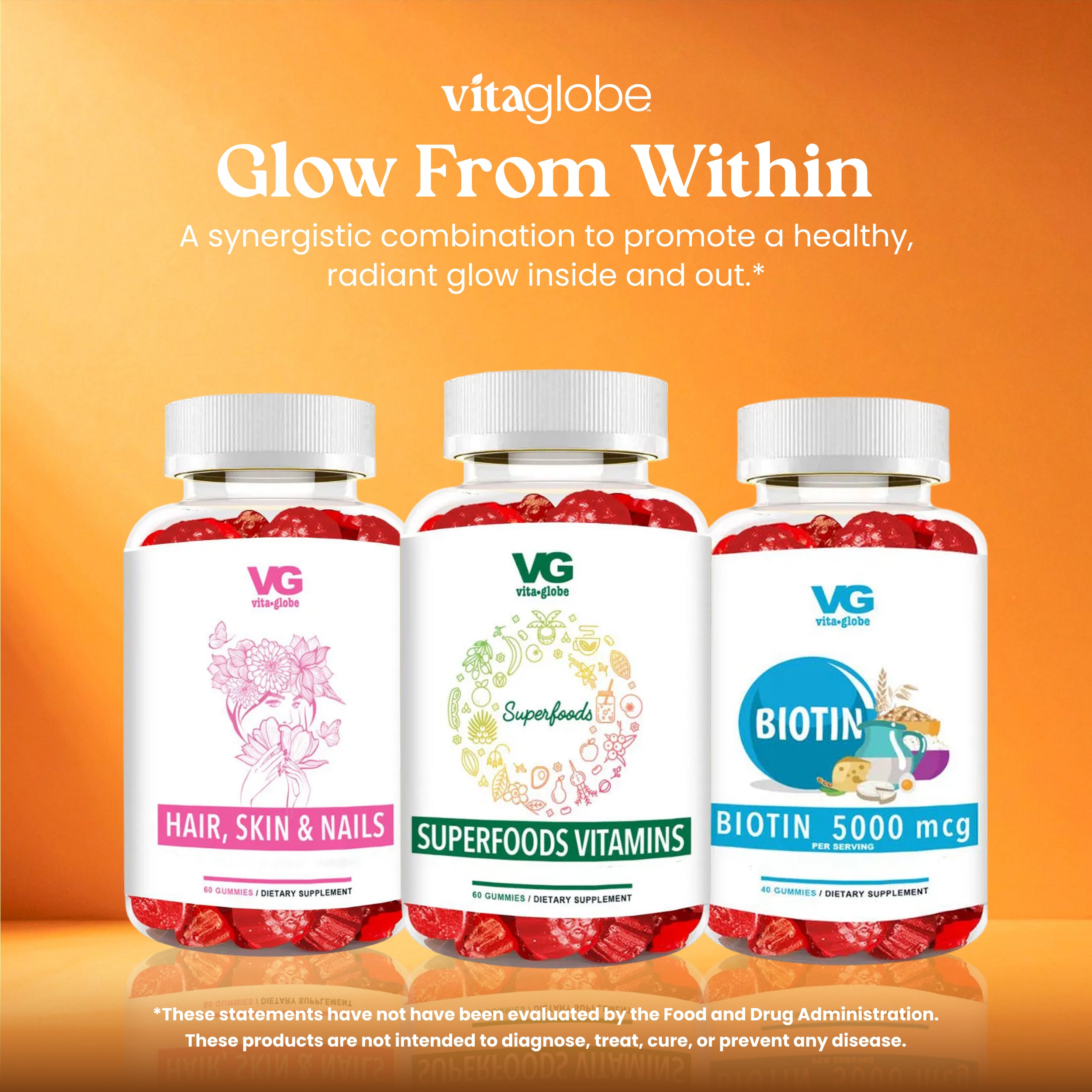 Three Vitaglobe dietary supplement bottles arranged on an orange gradient background with promotional text above. The bottles contain red capsules and have white labels reading Hair, Skin & Nails; Superfoods Vitamins; and Biotin 5000 mcg.