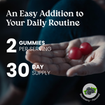 Hand holding two red gummies with text about serving size and supply duration on a dark background.