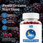 A bottle of VG Vita-Globe Melatonin 5 MG supplements shown against a background of fresh blackberries. The bottle is white with a blue and yellow moon graphic on the label.