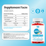 Biotin 5000 mcg dietary supplement gummies in a clear bottle with a white cap and label, shown next to a Supplement Facts panel on a light blue background. The bottle contains red gummies, and the label includes VG Bio and certification icons for vegan, non-GMO, and gluten free.