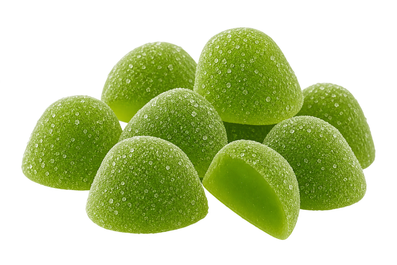 Green dome-shaped gummy candies coated with sugar crystals, with one candy cut in half to show the smooth green center, on a solid white background.