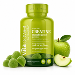 A bottle of Vita Power Creatine Monohydrate gummies in tart green apple flavor, shown with whole and sliced green apples on a clean white background.