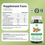 VG Vita Globe Ashwagandha dietary supplement bottle shown next to a white Supplement Facts label on a light green background. The bottle is dark green with a white cap and features a label with green and white text, red berries, and illustrations of green leaves.