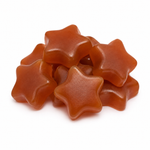 A pile of glossy, star-shaped gummy candies in a warm caramel-brown color, arranged on a clean white background.