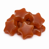 A pile of glossy, star-shaped gummy candies in a warm caramel-brown color, arranged on a clean white background.