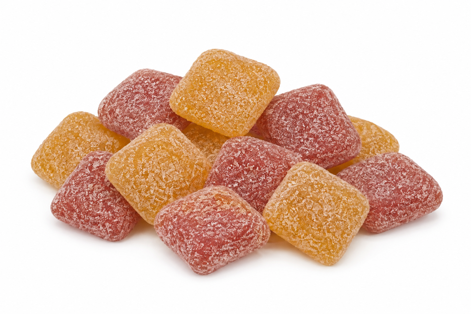 A pile of sugar-coated square gummy candies in orange and pink-red, photographed on a clean white background.
