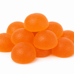 A pile of round, glossy orange gummy candies on a plain white background.