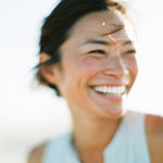 Woman smiling with a blurred background