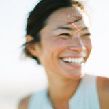 Woman smiling with a blurred background