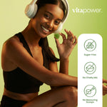 Woman eating VitaPower Tart Green Apple Creatine Gummies
