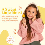A sweet little ritual: boy enjoying a Vitalolli Manuka Soothe lollipop, for ages 4+