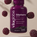 Vita Globe Elderberry gummies with Vitamin C and Zinc bottle floating with berry gummies