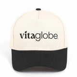 Vita Globe Two-Tone Hat: cream front panel, black brim and black vitaglobe logo