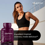 Woman in athletic wear with a bottle of Vita Globe Elderberry Gummies - Ingredient inspired wellness, made delicious